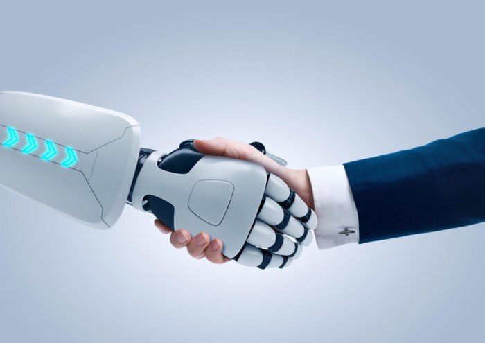 Robot and Business Man Shaking Hands